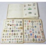 Two scrap albums and contents of heraldic seal stamps,