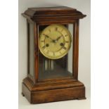 Late 19th century beech and glazed cased mantel clock, W23cm,