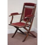 Edwardian walnut folding campaign chair with upholstered seat,