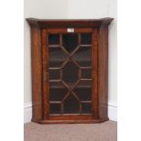 Early 20th century oak corner display cabinet enclosed by single astragal glazed door, W55cm,