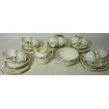 Early 20th century tea service - twelve place settings Condition Report <a