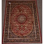 Persian Keshan design red ground rug,