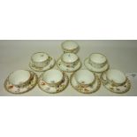 Four early 20th century Dresden tea cups and saucers,