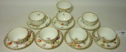 Four early 20th century Dresden tea cups and saucers,