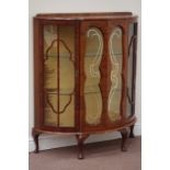 Early 20th century walnut serpentine display cabinet enclosed by two glazed doors, W98cm, H116cm,