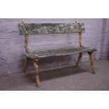 Victorian rustic cast iron and wood slatted log bench,