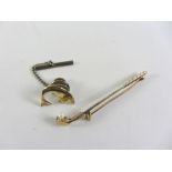 Two tone gold golf club brooch set with a pearl ball hallmarked 9ct and a 9ct gold salmon tie tack