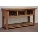 Reclaimed waxed pine dresser raised on potboard base, fitted with three metal cages, W158cm, H85cm,