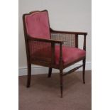 Edwardian stained beech bergeré armchair upholstered in pink fabric Condition Report