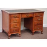 Edwardian walnut knee hole desk fitted with nine drawers, gadrooning top moulding,