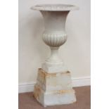 White finish cast iron single centre piece urn on plinth, D55cm,