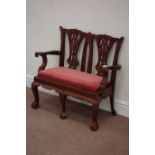 Small mahogany Chippendale style two seat settee with upholstered drop in seat, W75cm,