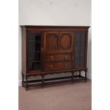 Early 20th century oak fall front secretaire bookcase fitted with two drawers and two glazed