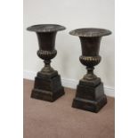 Pair bronze finish cast iron urns on plinths, egg and dart rim decoration, D46cm,