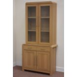 Oak finish display cabinet on double cupboard fitted with single drawer, W91cm, H191cm,