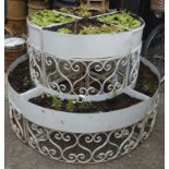 Four sectional white finish wrought metal circular plant stand with two tier planters