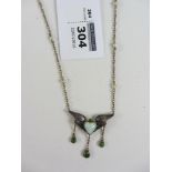 Art Nouveau opal and peridot set winged pendant necklace stamped C&C each side of daisy