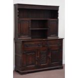 Early 20th century oak carved linen-fold dresser fitted with two drawers and two cupboards,