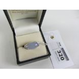Blue chalcedony and diamond contemporary ring stamped 750 approx 9gm gross Condition