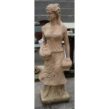 Composite stone figure of a young woman with baskets of fruit Condition Report