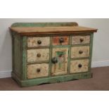 Victorian painted dresser base fitted with seven drawers and centre cupboard, waxed pine top,