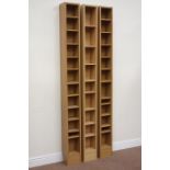 Three oak finish CD towers. H203cm Condition Report <a href='//www.