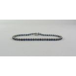 Fifty four stone round cut Sapphire bracelet tested to 14K,