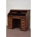Early 20th century oak tambour roll top desk, twin pedestals fitted with seven drawers and slides,
