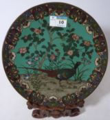 Early 20th Century Cloisonne plate decorated with a pheasant 24cm with wooden stand