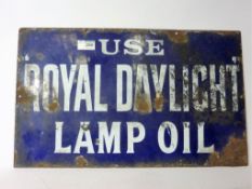 Vintage enamel on tin sign - 'Use royal Daylight Lamp Oil',