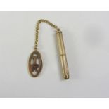 Gold engine turned toothpick hallmarked 9ct with fob and chain stamped 9ct,