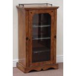 Victorian walnut and ebonised music cabinet enclosed by single glazed door, W56cm, H96cm,