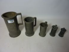 Set of five 19th/20th century French graduated pewter measuring jugs H18cm diminishing