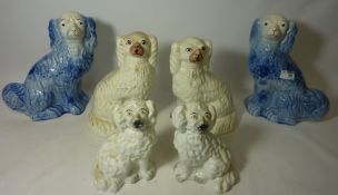 Two Arthur Wood Staffordshire type dogs with blue and white floral design and two pairs of