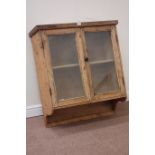 19th century pine wall hanging display cabinet enclosed by two glazed doors, W85cm, H95cm,