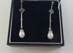 Pair of marcasite and freshwater pearl pendant earrings Condition Report <a