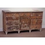 Late 19th century rustic pine dresser base fitted with nine drawers and centre cupboard, W163cm,