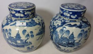 Pair of large 19th Century blue and white ginger jars decorated with the willow pattern and Peony