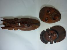 Three carved tribal masks Condition Report <a href='//www.davidduggleby.