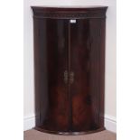 Early 19th century figured mahogany bow front corner cabinet, strapwork decoration, W60cm,