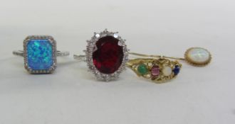 Three dress rings stamped 925 and SIL and a stock pin Condition Report <a