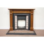 Edwardian cast iron fireplace fitted with tiled uprights,