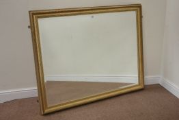 Rectangular gilt framed mirror fitted with bevelled glass,