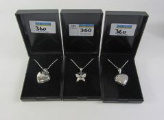 A butterfly and two heart shaped hinged locket pendants with chain necklaces stamped 925