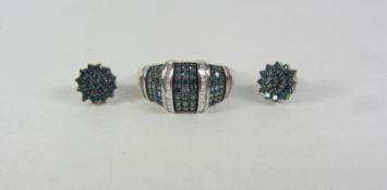 Blue diamond and white gold pave set ring amounting to approx .
