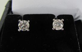 Pair of diamond white gold stud ear-rings stamped 750 approx 0.