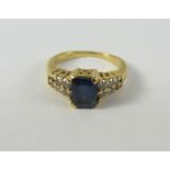 Gold sapphire ring with diamond set shoulders stamped 18K 18ct Condition Report