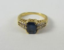 Gold sapphire ring with diamond set shoulders stamped 18K 18ct Condition Report
