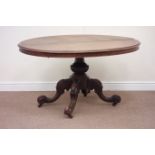 Victorian mahogany tilt top oval loo table raised on carved gadroon baluster base fitted with