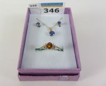 Gold citrine dress ring hallmarked 9ct and a necklace set blue stone and matching earrings